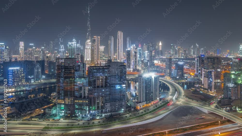 Panoramic skyline of Dubai with business bay and downtown district night timelapse. Panoramic skyline of Dubai with business bay and downtown district night timelapse.