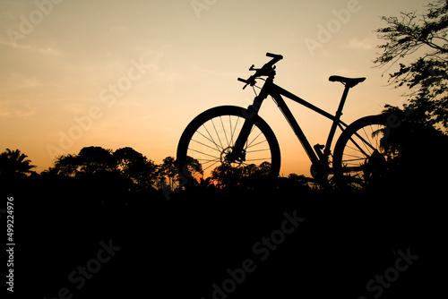 Silhouette of a mountain bike in the evening. fitness and adventure ideas