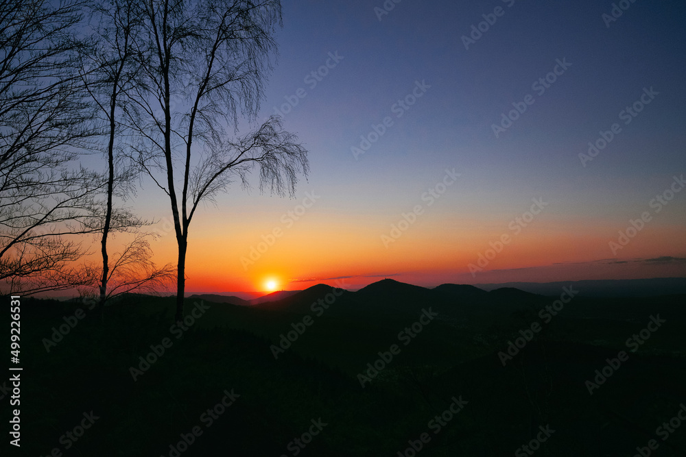 Naklejka premium sunset in the mountains