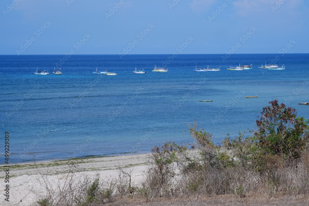 Fishing boats on quiet Katewel beaches, Southwest Sumba, NTT, Indonesia Fishing boats on quiet Katewel beaches, Southwest Sumba, NTT, Indonesia