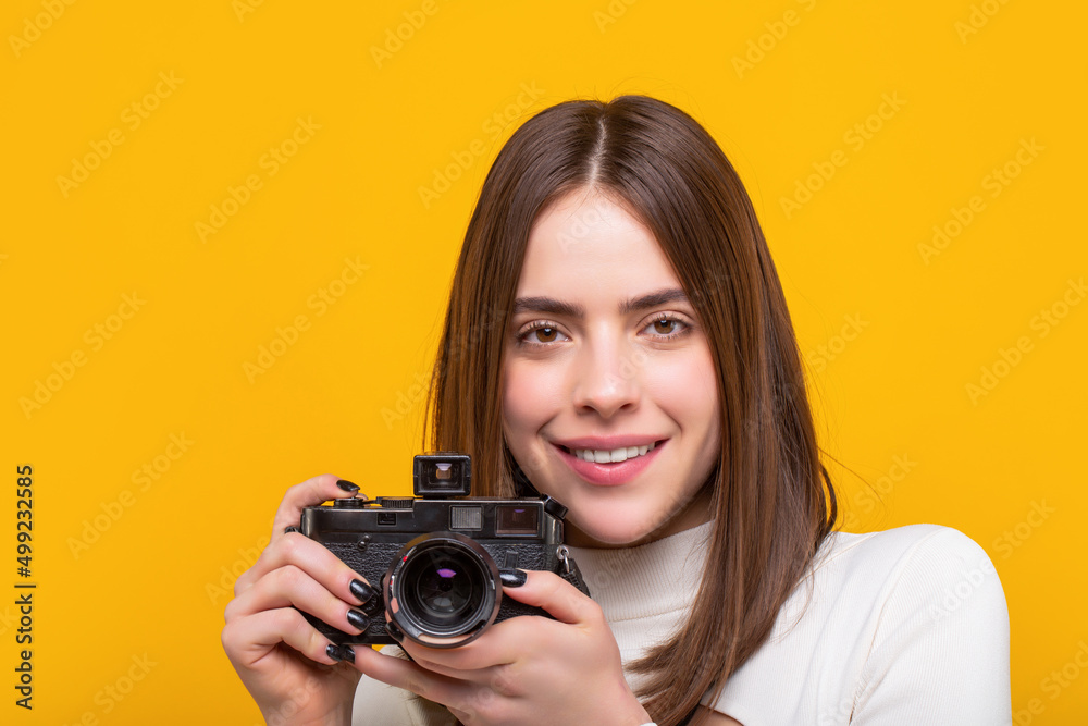 Girl using a camera photo. Photographer camera photo, Girl with a cameras. Woman holding camera. photographing girl joy make photography taking concept Girl using a camera photo. Photographer camera photo, Girl with a cameras. Woman holding camera. photographing girl joy make photography taking concept