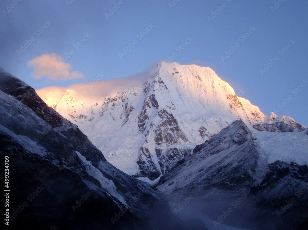 A magnificient view of Mt. Kangchengyao Peak 6889 mtr during sunrise as seen from the base camp in North Sikkim.