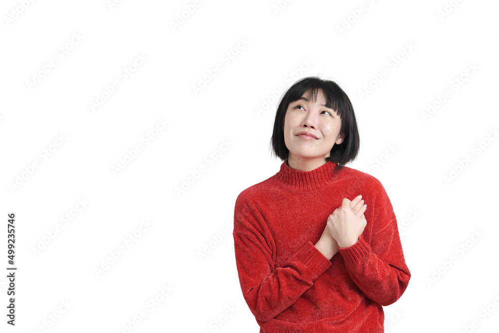Young asian woman reminiscing about love wearing winter red sweater, isolated. Young asian woman reminiscing about love wearing winter red sweater, isolated.