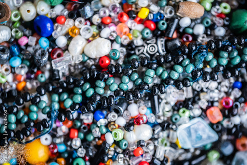 Close up view of different color glass beads