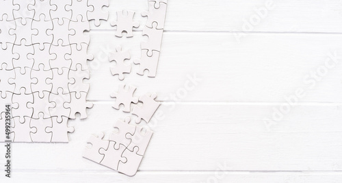 Matching pieces of empty puzzle on white background photo