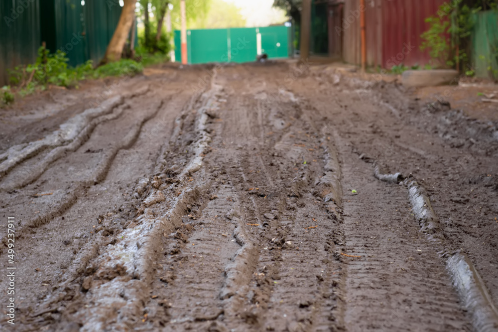 Mud on the road, dirt road in spring, rural dirt road after rains in spring, Mud on the road, dirt road in spring, rural dirt road after rains in spring,