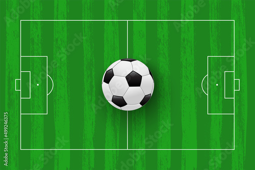 Green football field flat lay. Soccer stadium vector plan with white lines and realistic ball on center.