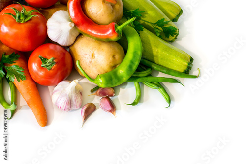 Composition of fresh vegetables on a white background. Healthy food for people.