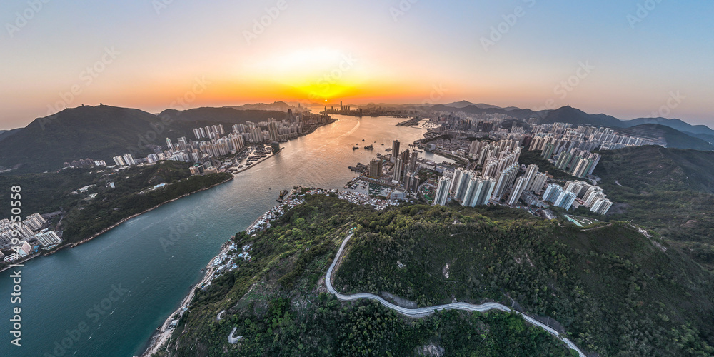 Panorama aerial view of Hong Kong crowded building at magic hour