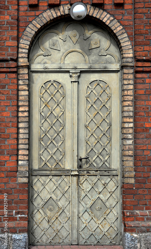 General view and architectural details of a close-up of the Catholic church of St. Michael the Archangel built at the turn of the 19th and 20th centuries in Jabłonka Koscielna in Podlasie, Poland. photo