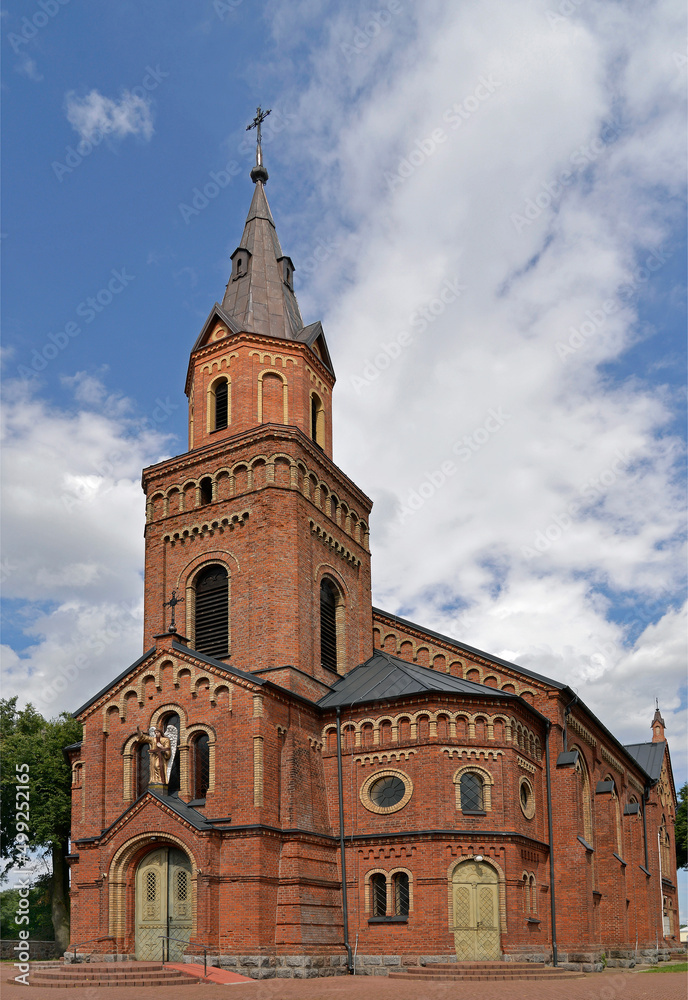 General view and architectural details of a close-up of the Catholic church of St. Michael the Archangel built at the turn of the 19th and 20th centuries in Jabłonka Koscielna in Podlasie, Poland.