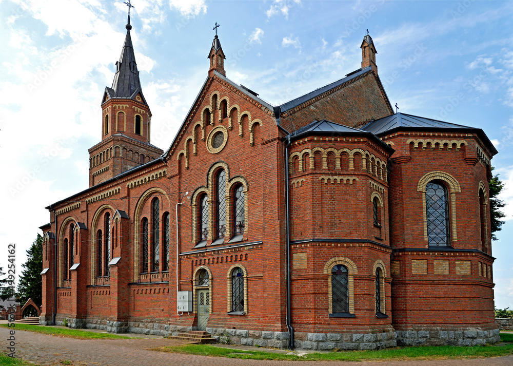 General view and architectural details of a close-up of the Catholic church of St. Michael the Archangel built at the turn of the 19th and 20th centuries in Jabłonka Koscielna in Podlasie, Poland.