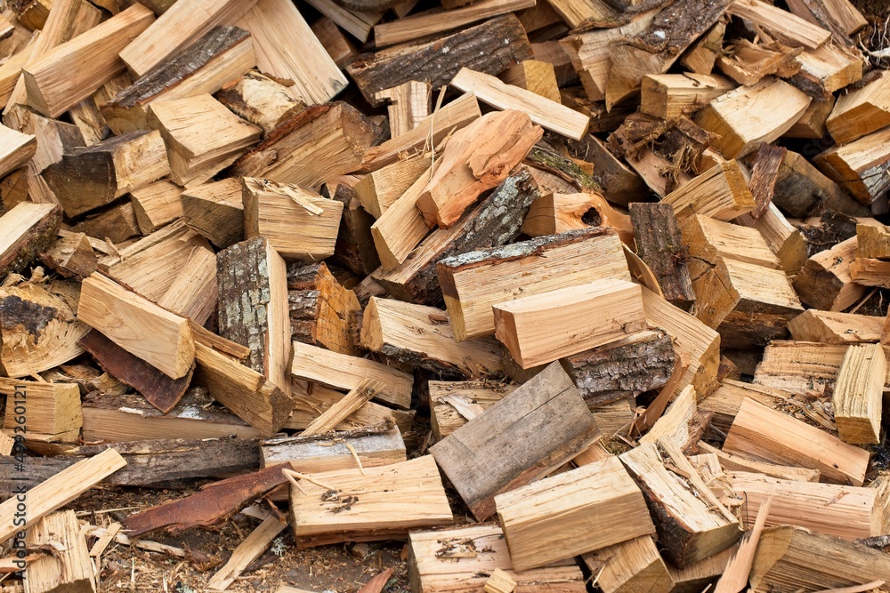 Hardwood pile ready to be used as firewood Hardwood pile ready to be used as firewood