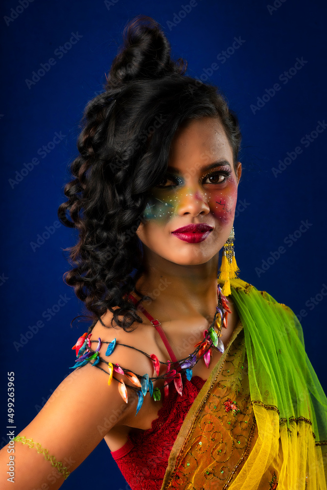 Fototapeta premium A gorgeous Young model beautiful woman or girl with perfect art creative makeup like a butterfly.
