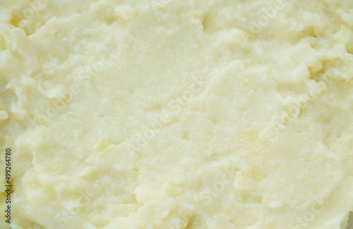mashed potato with salt on plate background and texture