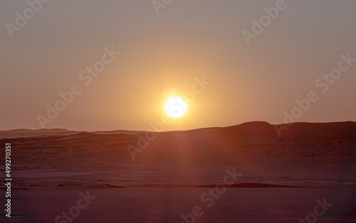 sand dunes in a sunset