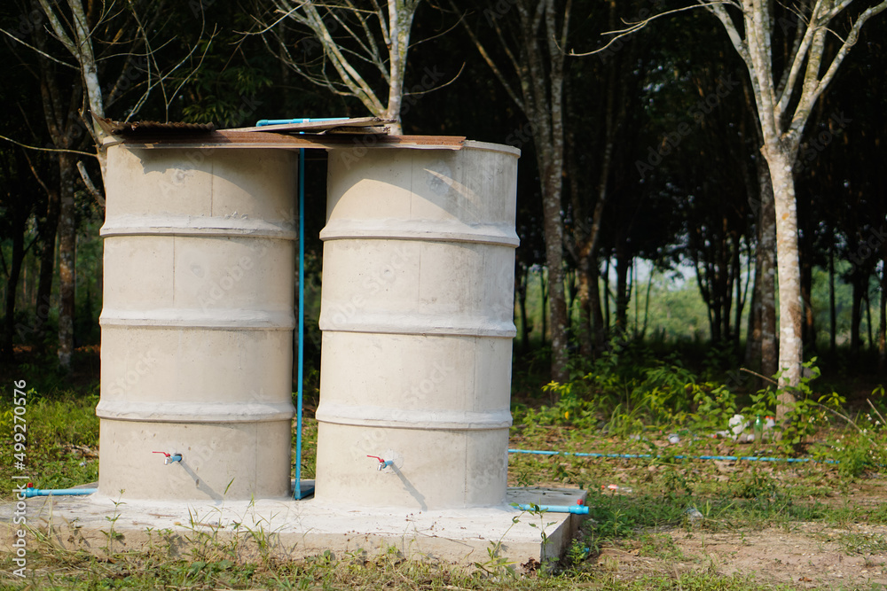 Cement water tanks at garden for keeping water that local gardeners in