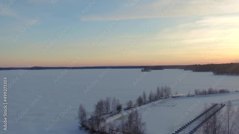 Aerial view of frozen lake Pirkanmaa, boat harbour and winter scenery of Nokia, Finland. Aerial view of frozen lake Pirkanmaa, boat harbour and winter scenery of Nokia, Finland.