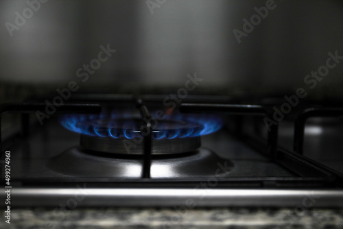 Gas stove, some stoves lit with a match with fire, to cook a good meal in the kitchen