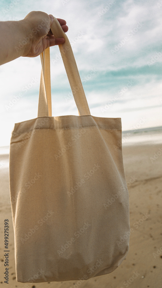 hand holding a paper bag for mockup Stock Photo | Adobe Stock