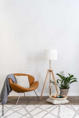 Retro style armchair at living room with antique decor