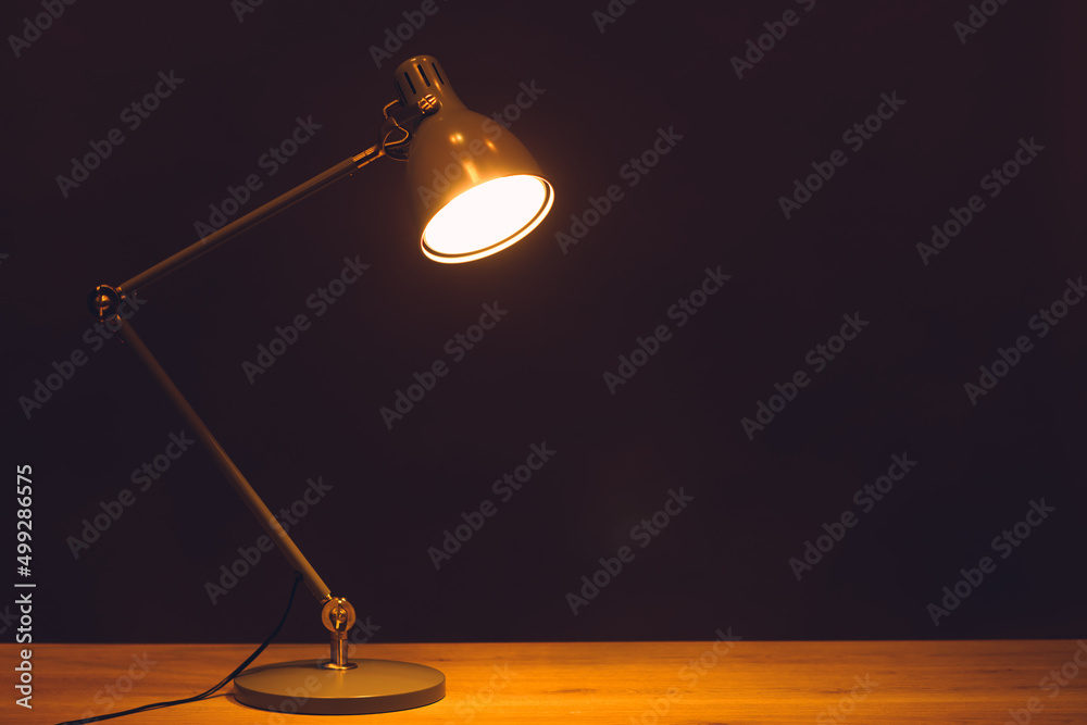 desk lamp, black background with copy-space desk lamp, black background with copy-space