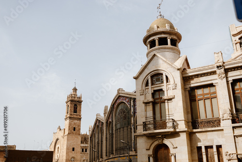 Exterior of the Central Market building in Valencia next to the Church of Santos Juanes photo