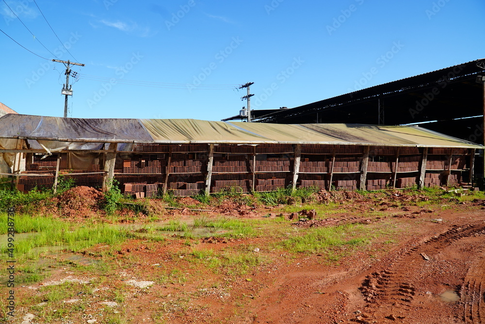 Drying halls for freshly fired clay tiles of an old brickyard in the middle of the Amazon region of Brazil. Manaus Cacau Pirera, Brazil. Drying halls for freshly fired clay tiles of an old brickyard in the middle of the Amazon region of Brazil. Manaus Cacau Pirera, Brazil.