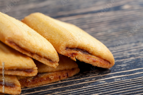 wheat cookies with fruit jam as a filling photo