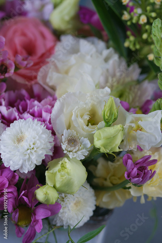 Decorative bouquet of many different small and large flowers