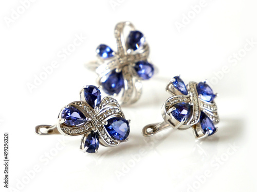 earring and ring set with big blue tanzanite and white diamonds around, jewerly shop, pawnshop concept