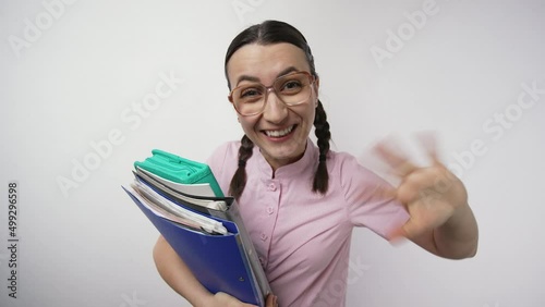 Nedd woman in glasses waving hand