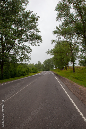 an empty old paved road