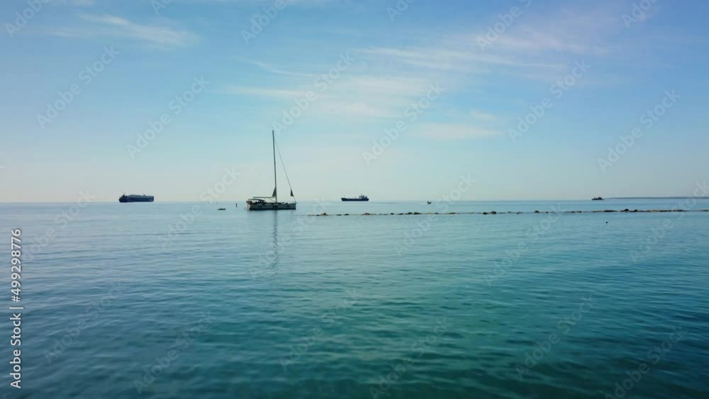 Drone flight over the Mediterranean coast in Cyprus in Limassol on a sunny day.
