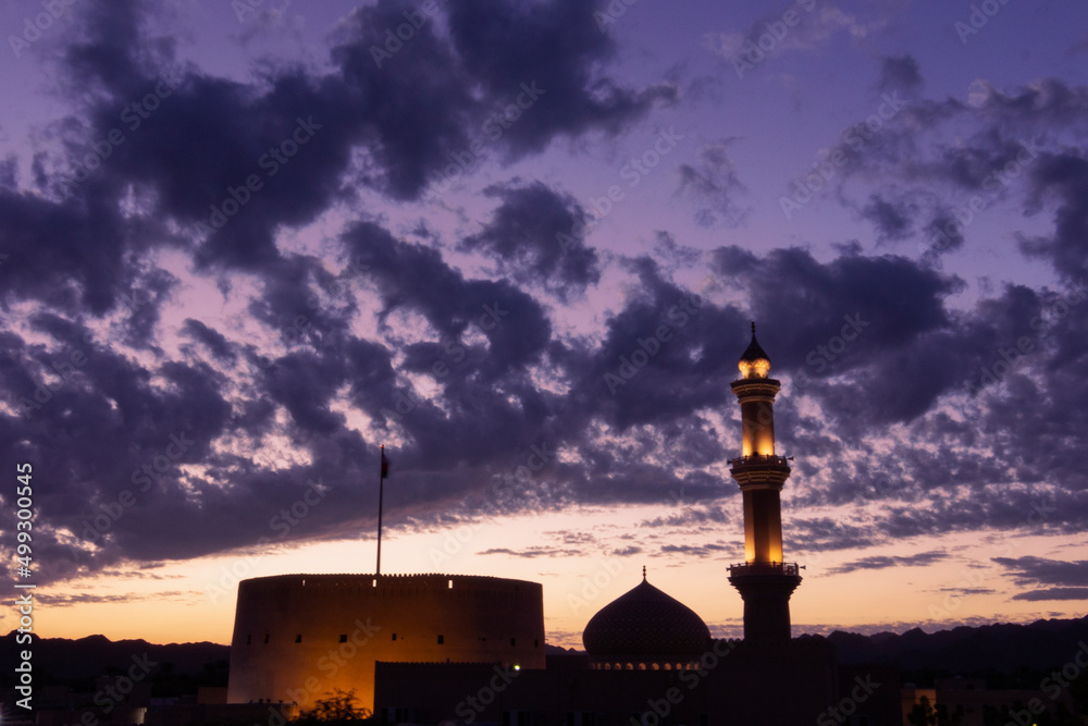 The city of Nizwa at night, where the castle and the mosque appear in the picture, which are two of the most popular places in Oman