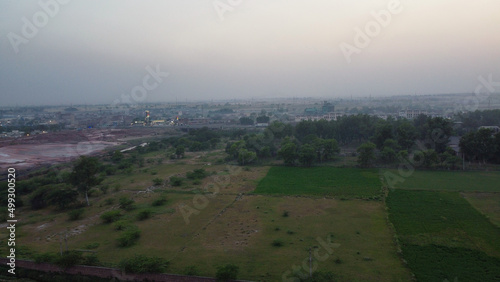 an aerial view of Kala Shah Kako Punjab Pakistan at Sunset, drone footage photo