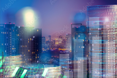 Financial investment concept, Double exposure of city night and stack of coins for finance investor, Forex trading candlestick chart, Cryptocurrency Digital economy. background for invest