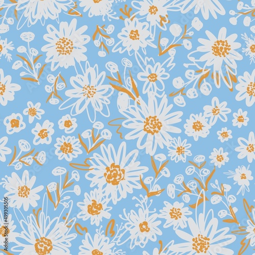 Seamless pattern with chamomile flower on a blue background