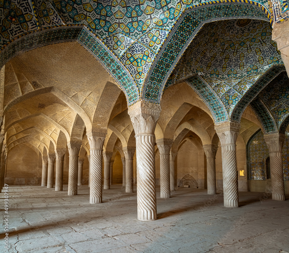 Shiraz, Iran - May 2019: The prayer hall of Vakil Mosque with columns. Vakil means regent, title of Karim Khan, founder of Zand Dynasty.