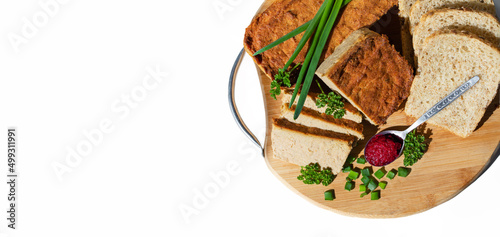 baked homemade pate with parsley and chives