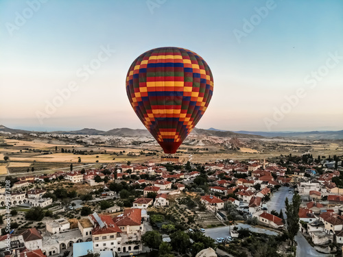 creColorful hot air balloon fly over Capadocia city. Hot air balloons the great tourist attraction in Cappadocia, Turkeyated by dji camera © Anna