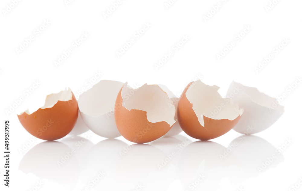 Cracked egg shells close up on white background Cracked egg shells close up on white background