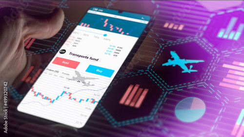 Exchange-traded fund chart, Stock market data on smartphone. Business analysis of a trend. Invest in international shares ETF. Buying strategic transports fund