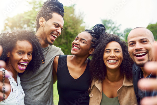 Laughing with friends is the best kinda laughing there is. Cropped shot of friends spending time together outdoors.