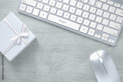 gift box on the table with keyboard and mouse