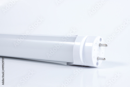 Close-up of LED fluorescent light tubes with white background