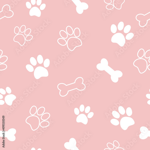 Pet paw seamless pattern.Vector illustration with paw and bone on pink background. It can be used for wallpapers, wrapping, cards, patterns for clothes and other.
