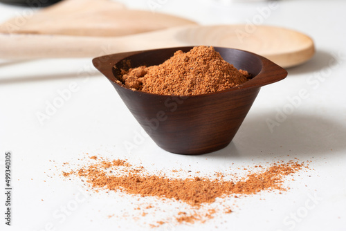 Nutmeg in a wooden bowl