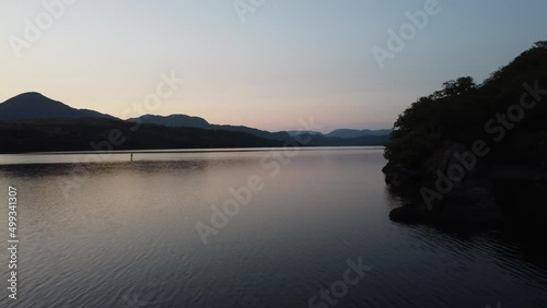 Paddle boarding, lake district, 4K lake, drone footage. This is a video of paddle boarding on lakes in the lake district England. 4K video footage. 