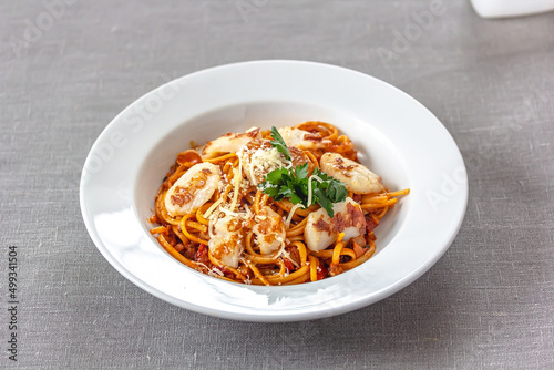 Italian Pasta with Scallop, Tomato Sauce IN A PLATE